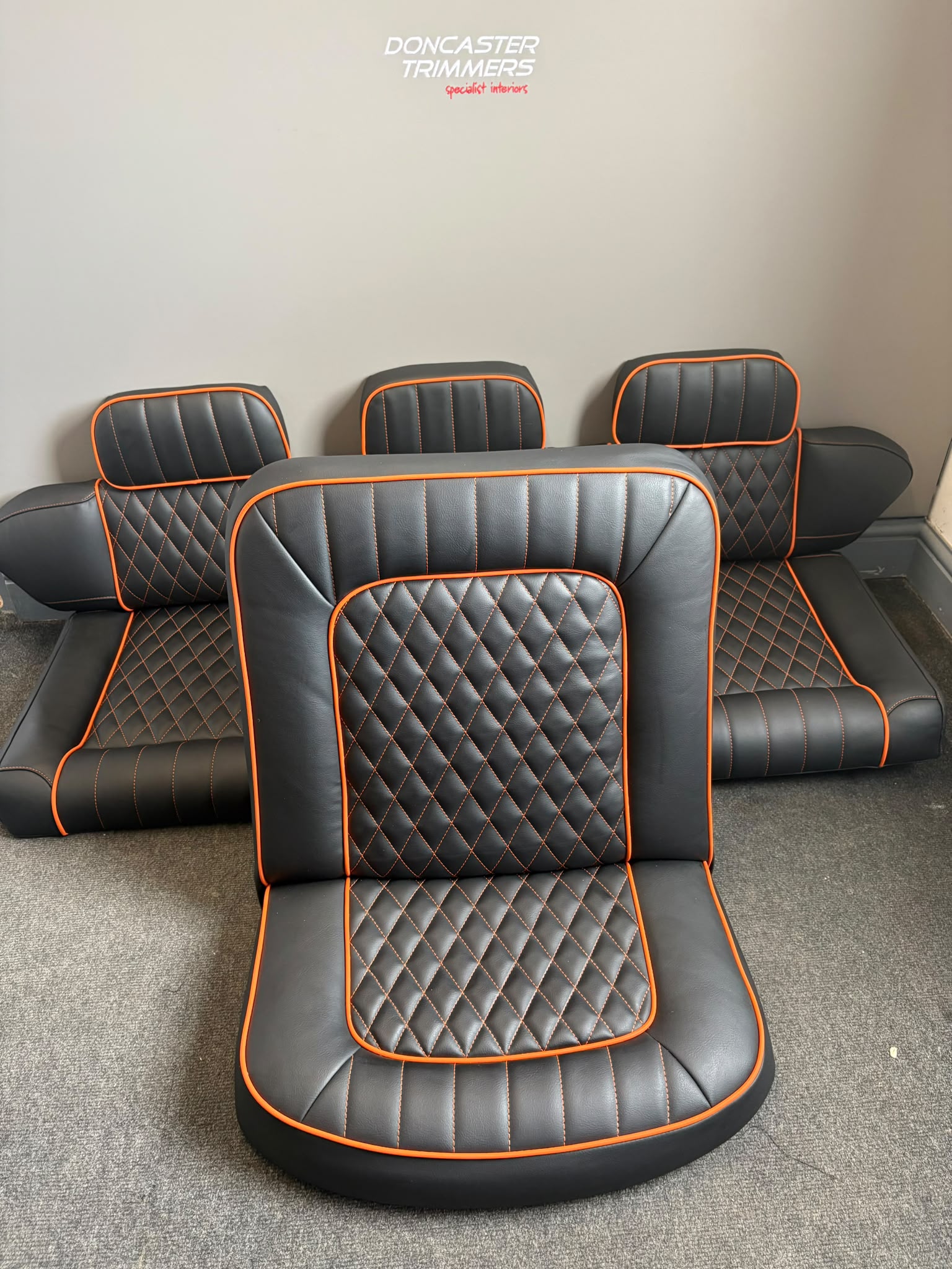 BOAT SEATS RIMMED IN MARINE VINYL